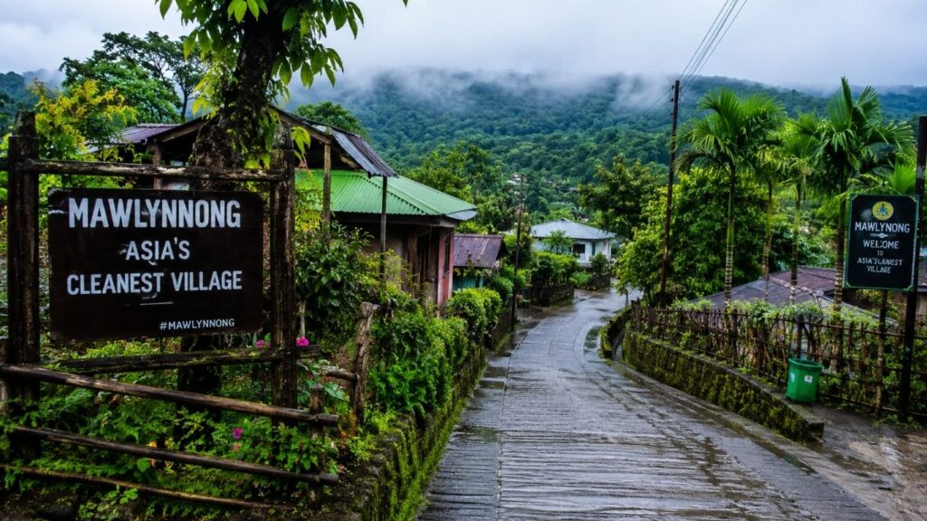 Monsoon in Meghalaya 2026,
Mawlynnong – The Cleanest Village in Asia, Mawlynnong, the cleanest village in Asia, surrounded by lush greenery in Meghalaya,