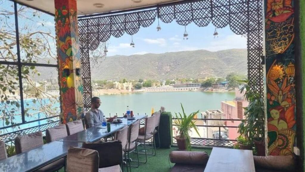 Best Places to Visit in Pushkar,
pushkar streets cafe culture rajasthan,
Café-lined heritage street in Pushkar, Rajasthan,
